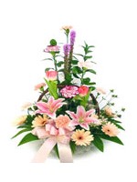 Assorted Flowers Arranged In a Basket